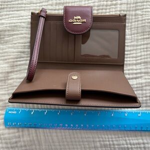 Coach wallet / cell phone keeper lightly used